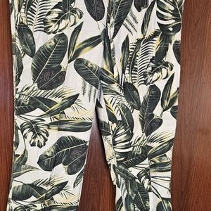 Women Hawaiian style pants yellow, green and white.